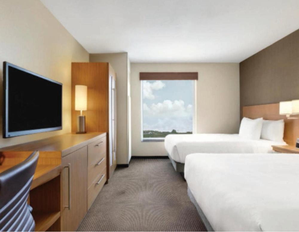 Queen Room with Two Queen Beds, Sofa Bed and Accessible Tub interior